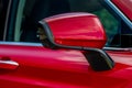 Close up front view of car side mirror. Front rear view mirror on the car window. Royalty Free Stock Photo