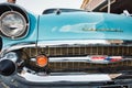 Close-up view of the grill and bumper of an aqua marine blue 1950s Chevrolet Belair Royalty Free Stock Photo