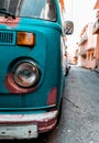 Close up front view of old vintage hippie van from the 60s. headlights windshield mask