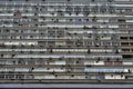 Close-up front view of a run down grey mass apartment block building close to the famous Paulista street in Sao Paulo, Brazil