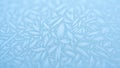 Close up of frost crystals on a pale blue background pattern texture Royalty Free Stock Photo
