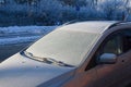 Close up of frozen car windshield in winter Royalty Free Stock Photo