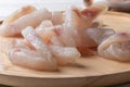 Frozen pangasius dory on wooden plate