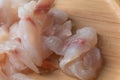 Frozen pangasius dory on wooden plate