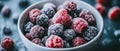 Close-up of Frozen Raspberries and Blackberries in a White Bowl Royalty Free Stock Photo