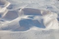 Close up of frozen white snow. Winter background. Snowy texture.