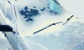 Close up frozen winter car covered snow, view front window windshield on snowy background Royalty Free Stock Photo