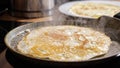 Close-up of frying pancake in a pan Royalty Free Stock Photo