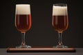 Close-up of full beer glasses with golden foam on rustic wooden bar counter in traditional pub setting Royalty Free Stock Photo