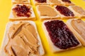 Close-up full frame shot of bread slices with preserves and peanut butter arranged alternatively Royalty Free Stock Photo