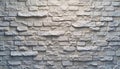 Rugged White Stone Veneer Wall Texture Background. Natural Limestone or Chalk Brick Surface Pattern. Royalty Free Stock Photo