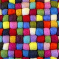 Multi coloured felt bobble table mat Royalty Free Stock Photo