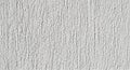 Textured White Wall Surface with Vertical Rough Grooves Background image photo Royalty Free Stock Photo