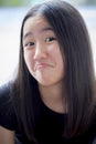 Close up funny kidding face of asian teenager Royalty Free Stock Photo