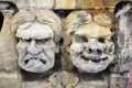 Close-up of funny soapstone masks