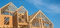 Close-up gable roof wooden house construction