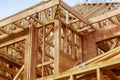 Close-up of gables roof on stick built home under construction New build roof with wooden truss, post and beam framework. Royalty Free Stock Photo