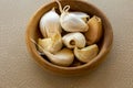 Garlic Cloves In Small Wooden Bowl