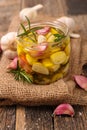 Garlic with olive oil and rosemary Royalty Free Stock Photo