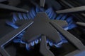 A close up of a gas stove with the burner on