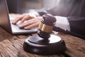 Close-up Of A Gavel On Wooden Desk Royalty Free Stock Photo