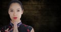 Close up of geisha hands together against dark grunge wood panel Royalty Free Stock Photo