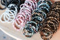 Close up of gemstone bracelets in the street market.