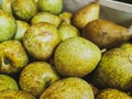 Close up of General Leclerc pears in wooden crates. Prepared for sale.