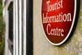 Close-up of a general Tourist Information Centre sign seen outside a visitor centre. Royalty Free Stock Photo