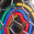 A close-up of a geometric glass structure featuring a hexagonal pattern Royalty Free Stock Photo