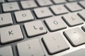 Close-up at German alphabet keypad on metal keyboard.