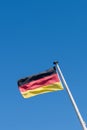 Close up of a German flag flying in the wind Royalty Free Stock Photo