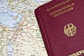 Close-up of a German Passport with a map of the Middle East Royalty Free Stock Photo