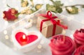 Close up of gift box and sweets for valentines day