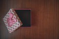 Close up of gift box on wooden background for special day Royalty Free Stock Photo