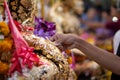 A close up of a gilding hand in an old Buddha statue in a Thai temple Royalty Free Stock Photo