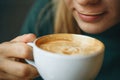 Close up girl is drinking coffee Royalty Free Stock Photo