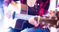 Close-up girl holding guitar. Royalty Free Stock Photo