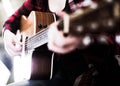 Close-up girl holding guitar. Royalty Free Stock Photo