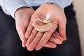 Close-up Of A Girl Holding Hearing Aid Royalty Free Stock Photo