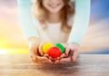 Close up of girl and mother holding easter eggs Royalty Free Stock Photo