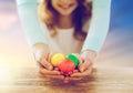 Close up of girl and mother holding easter eggs Royalty Free Stock Photo