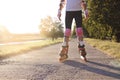 Close up of girl rollerblading in park. Outdoor, recreation, lifestyle, rollerblading. Royalty Free Stock Photo