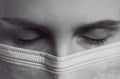 Close up on girl`s face wearing protection mask with closed eyes Royalty Free Stock Photo