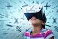 Composite image of close up of girl using virtual reality simulator Royalty Free Stock Photo