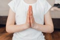 Close-up of the girl& x27;s hands folded for prayer. Relaxation and yoga practice for kids Royalty Free Stock Photo