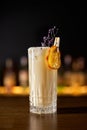 Close up glass of Alcoholic cocktail, classic Cuban rum, spiced liqueur and cream and a slice of orange