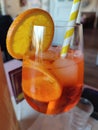 a Close up of a glass of Aperol spritz in restaurant