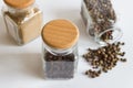 Close Up of glass bottle with seasonings spices herbs Royalty Free Stock Photo