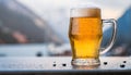 Close-up of glass of cold beer glass with foam on table. Cool beverage. Alcoholic drink